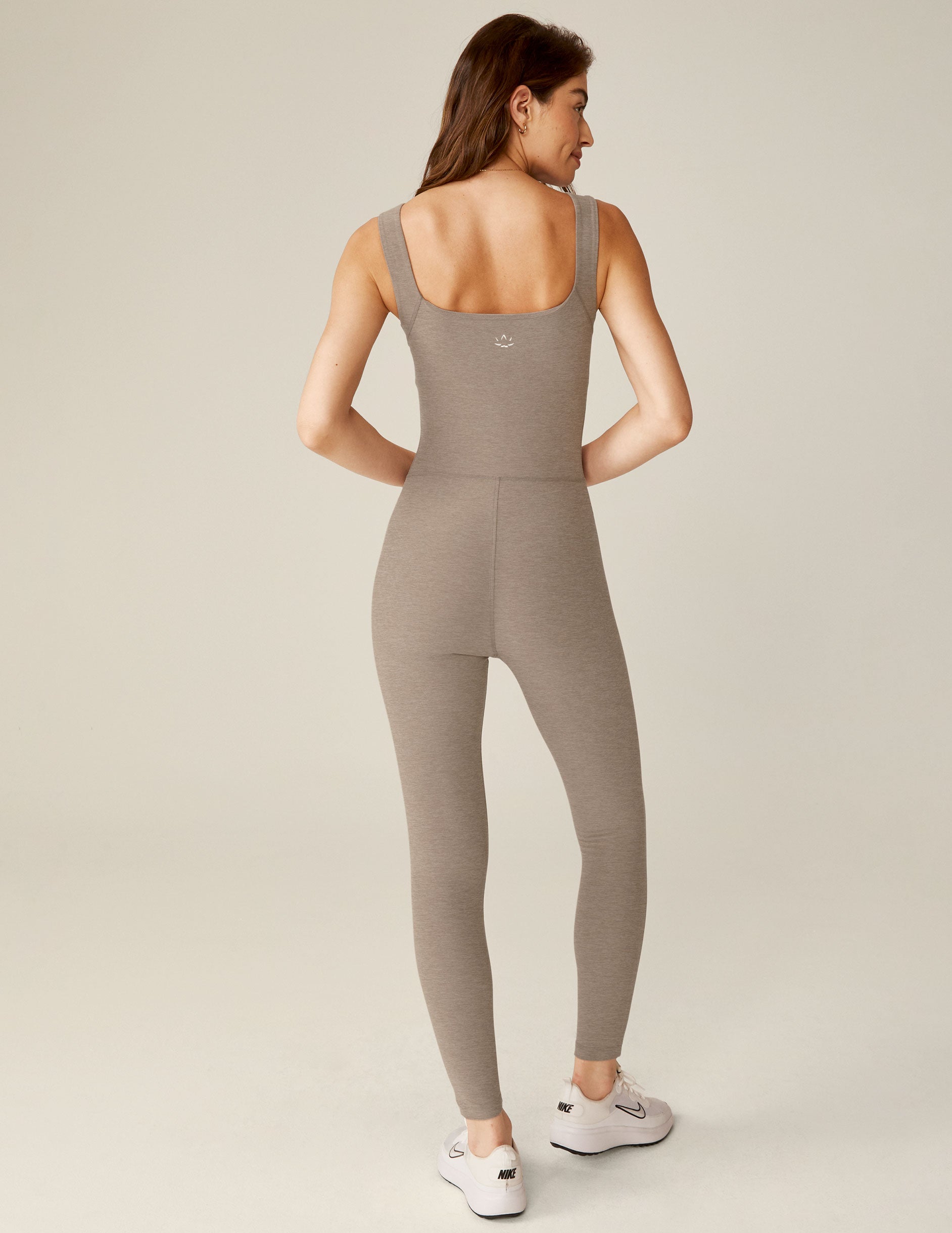 brown square neck tank top midi jumpsuit with white lining on the sides. 