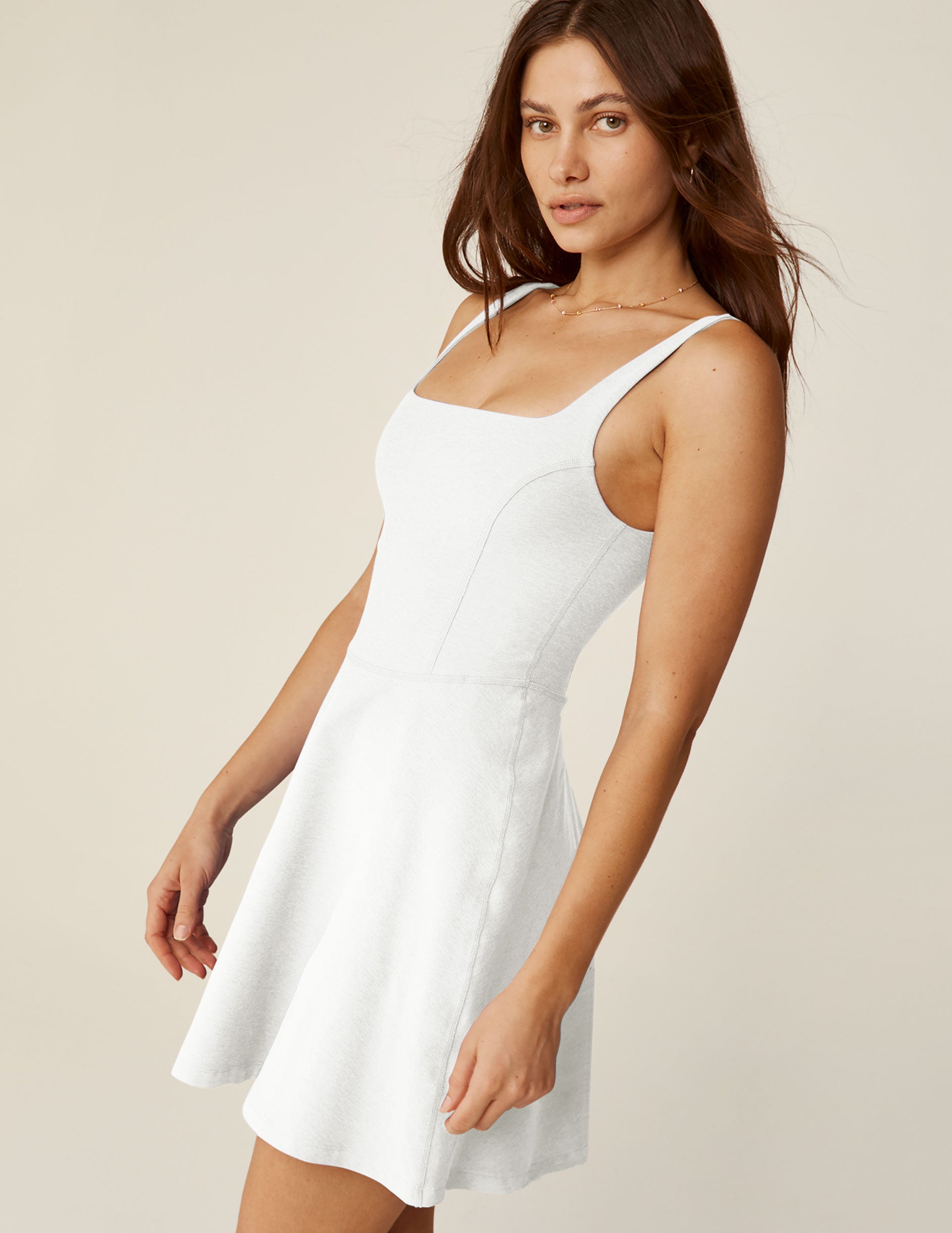 white spacedye dress with a squared neckline and built-in shorts with pockets. 