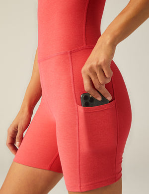 pink short jumpsuit with pocket at sides