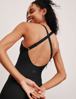 black biker jumpsuit with a built-in shelf bra and 5