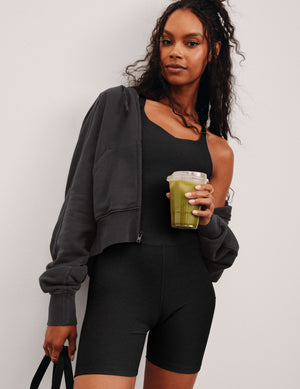 black biker jumpsuit with a built-in shelf bra and 5