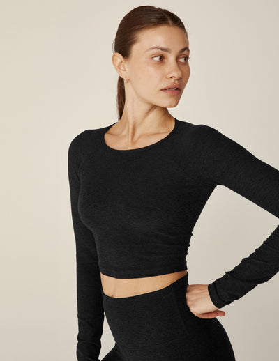 black long sleeve pullover with back strappy detail