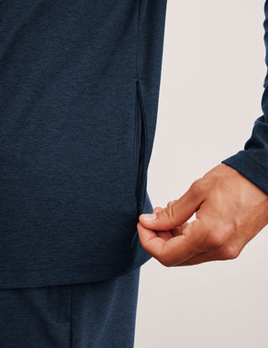 blue men's hooded pullover. 
