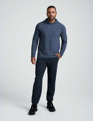 man wearing a blue hoodie sweatshirt. 