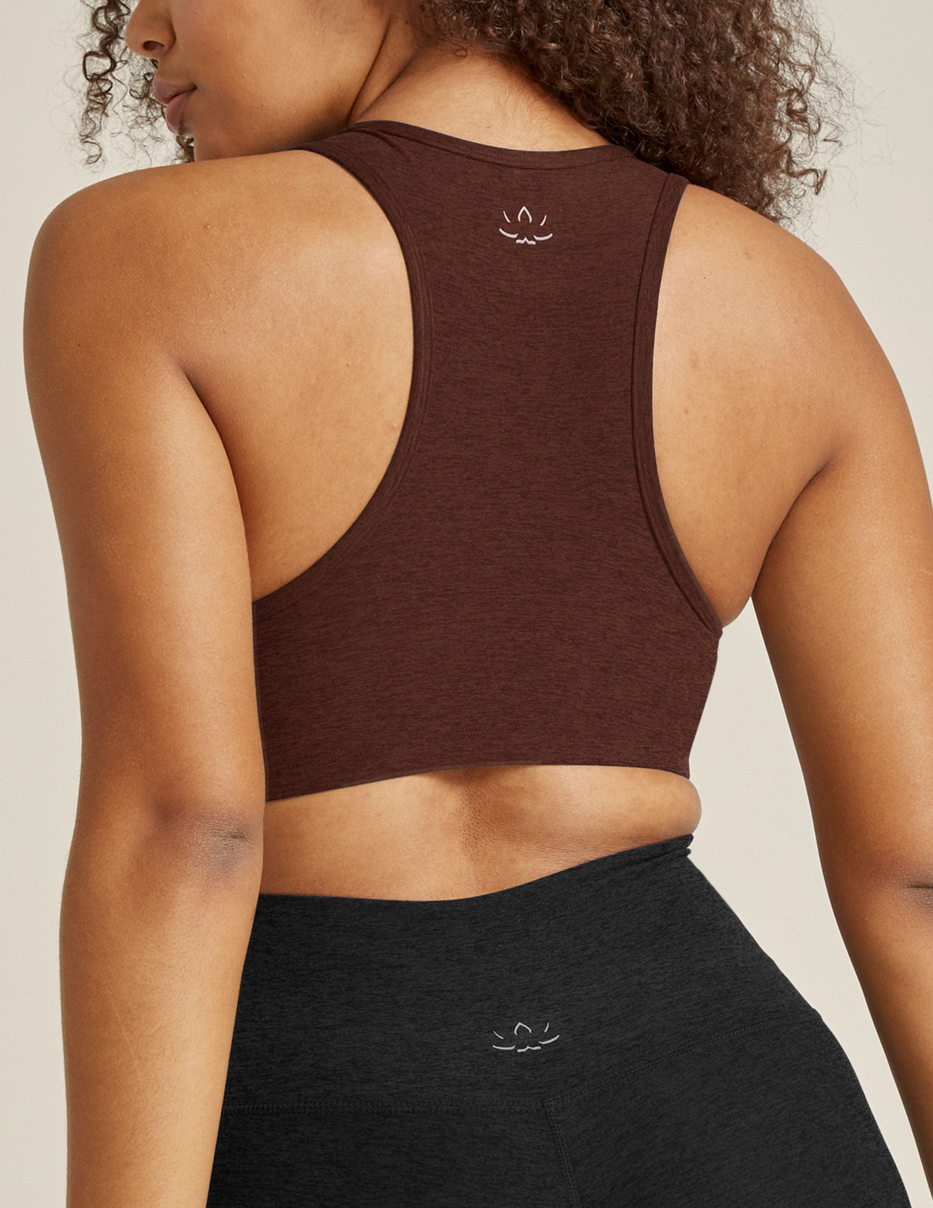 brown v-neck racerback sports bra with removable padding. 