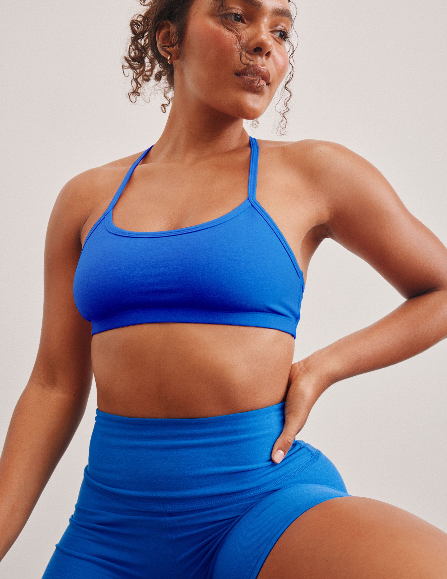 blue racerback bra top with slim spaghetti straps. 