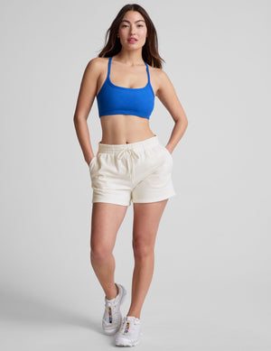 blue racerback bra top with slim spaghetti straps. 