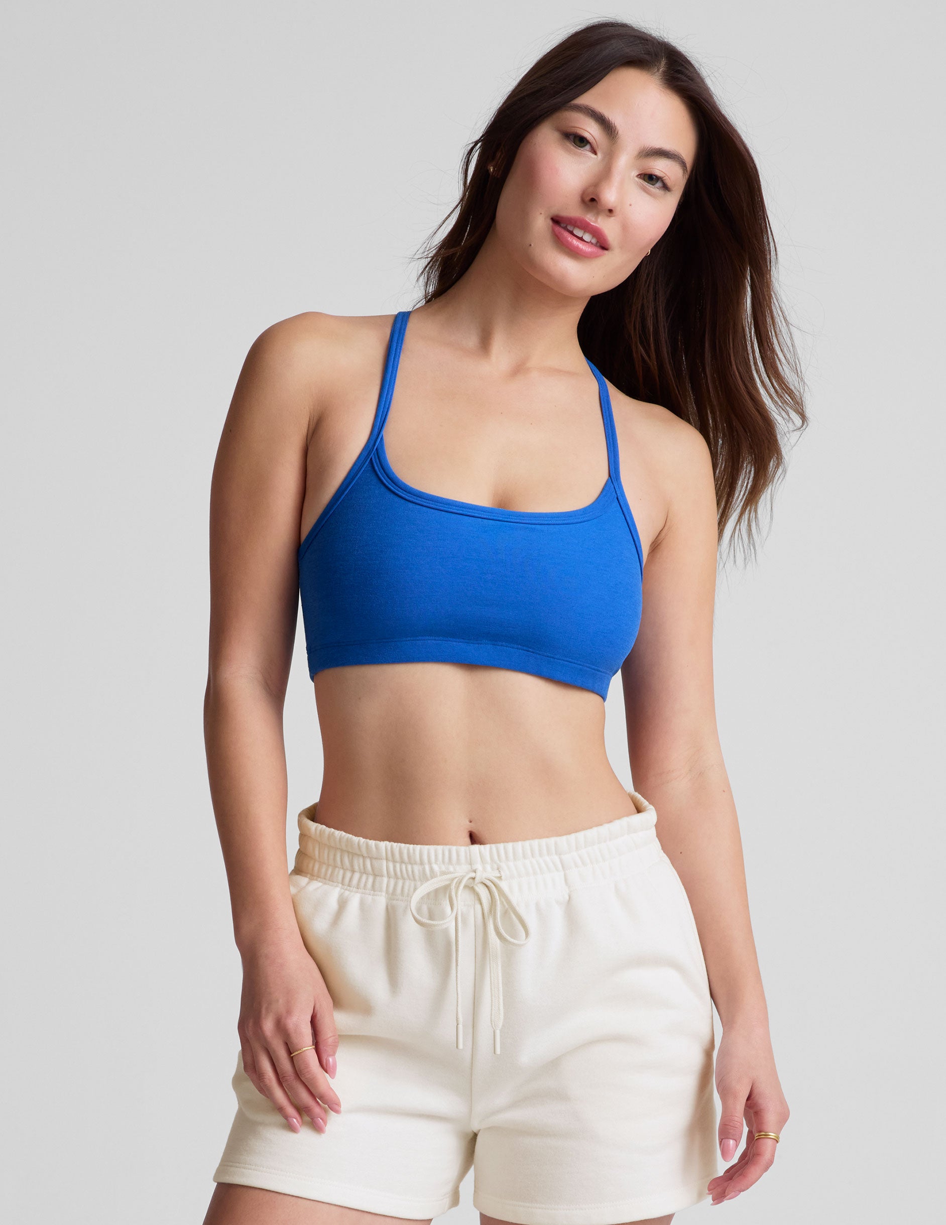 blue racerback bra top with slim spaghetti straps. 