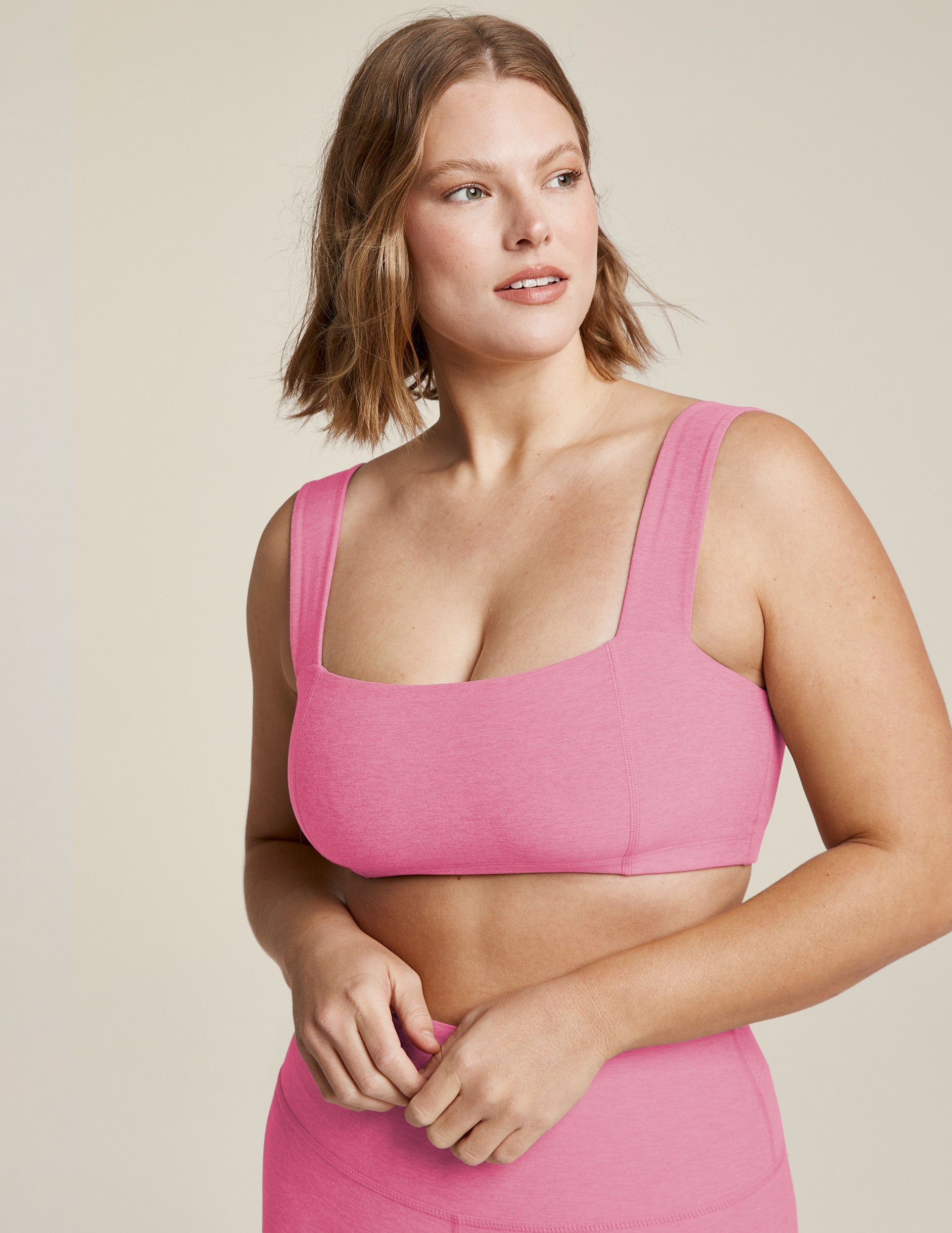 pink square neck bra top with contour seams. 