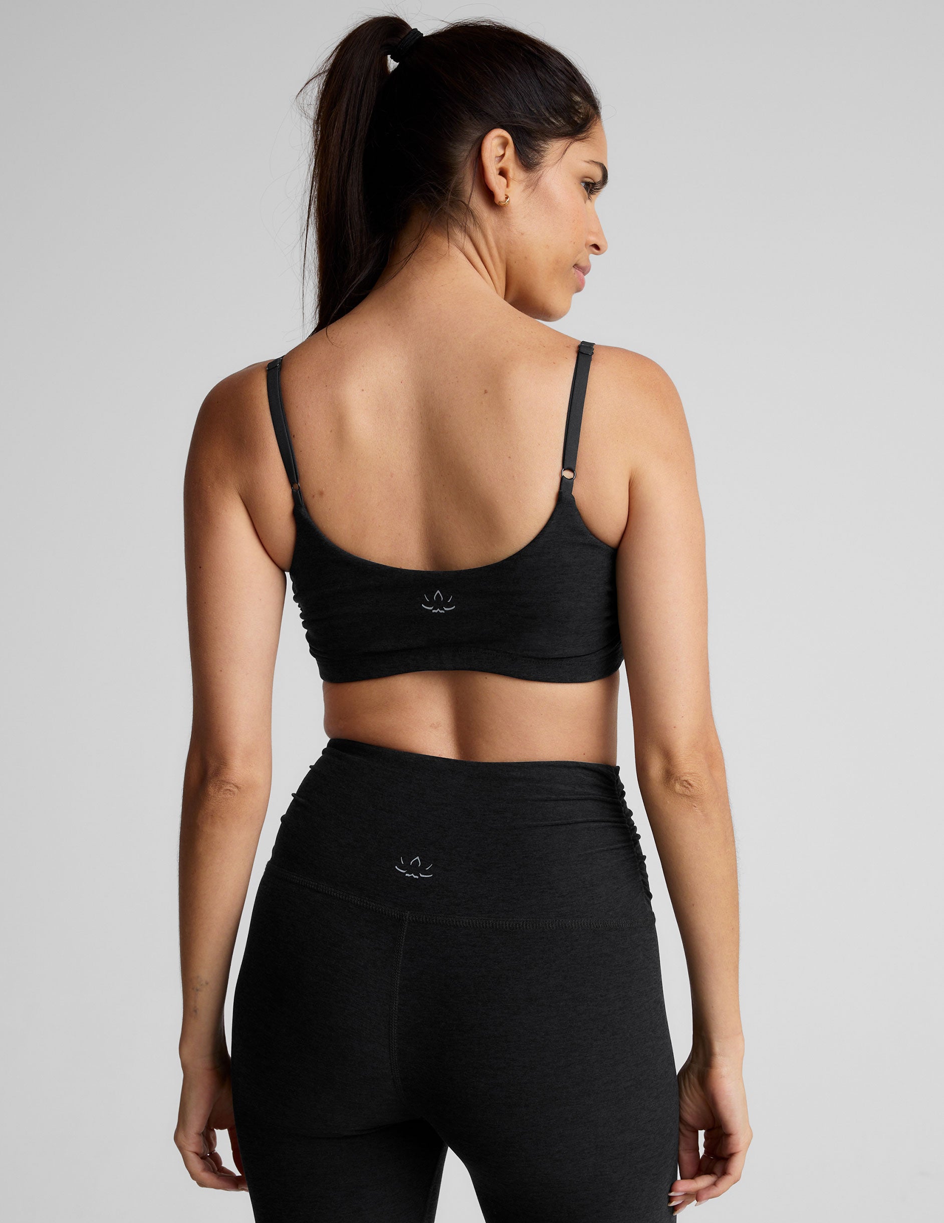 black slim racerback bra with shirred detailing on the sides. 