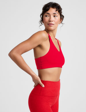 red v-neck bra top with crossover straps in the back. 