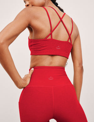 red v-neck bra top with crossover straps in the back. 