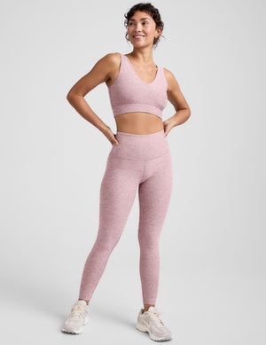 pink long line style bra with a front and back v-neck. 
