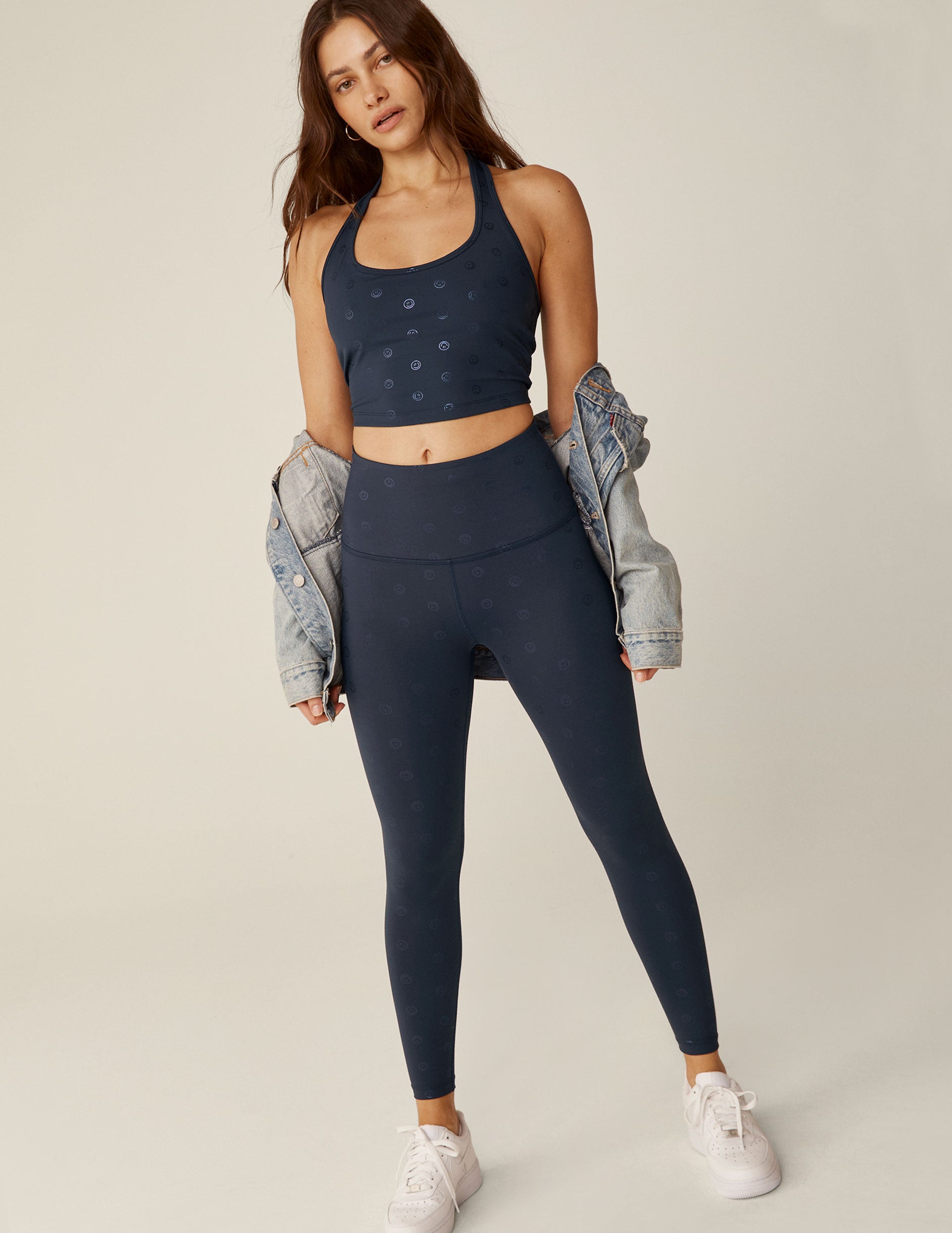 blue powershine halter cropped tank top with a happy face print. 