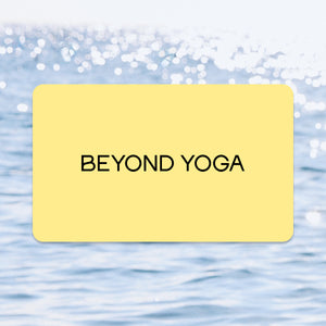 Yellow card with 'BEYOND YOGA' text on a blue water background. 