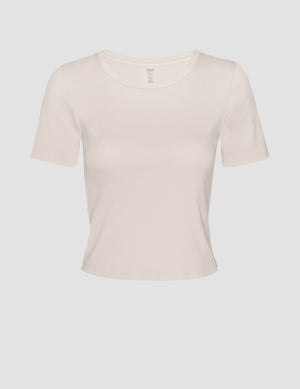 brown ribbed cropped top with a scoop neckline. 