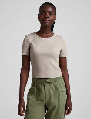 brown ribbed cropped top with a scoop neckline. 