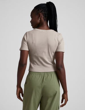 brown ribbed cropped top with a scoop neckline. 