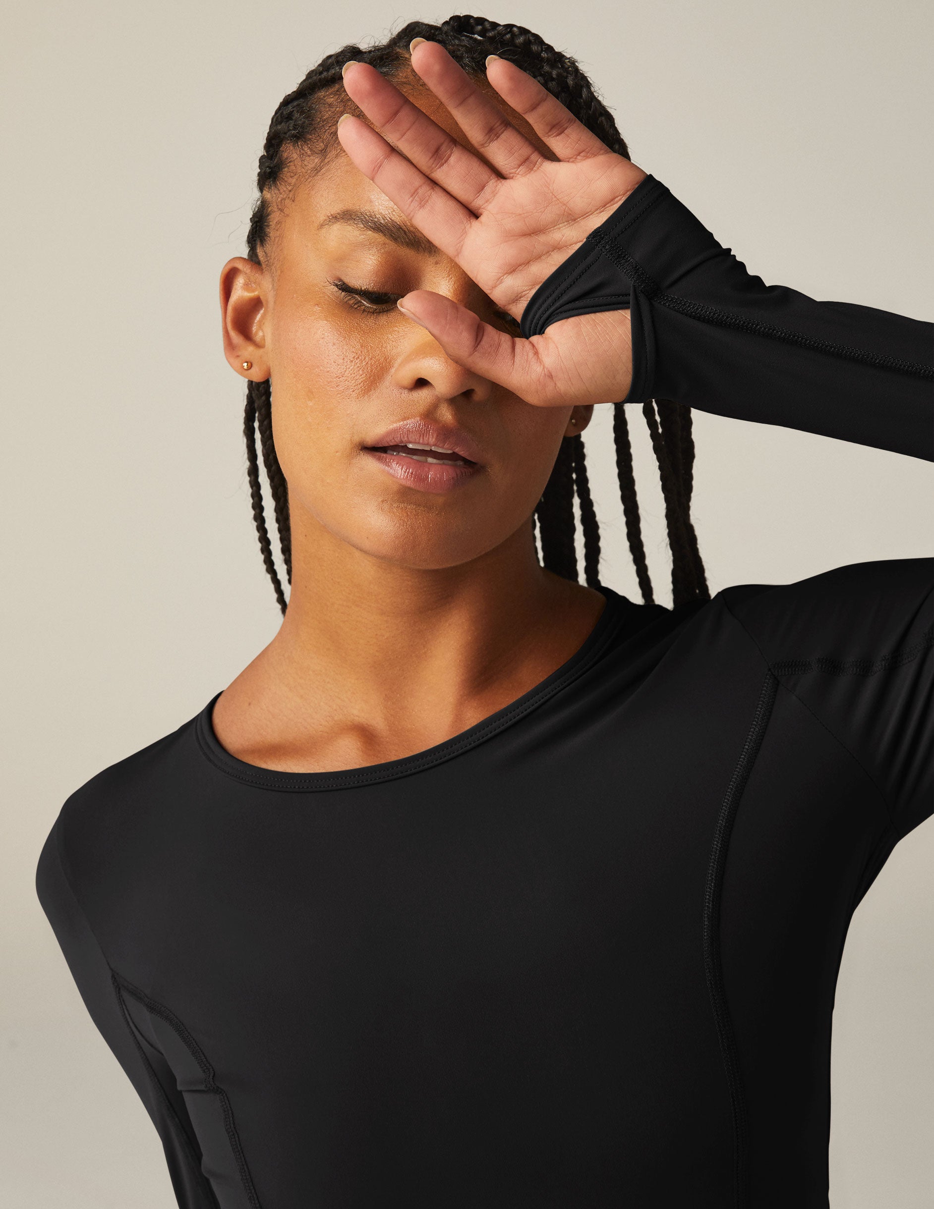 black powerbeyond lite long sleeve top with thumb holes. 