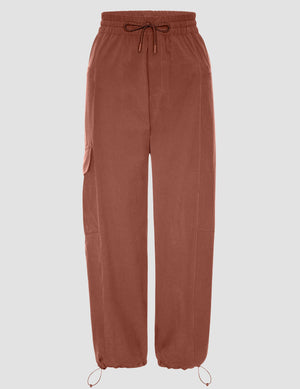 brown cargo pants with drawstring waist on a light gray background. 