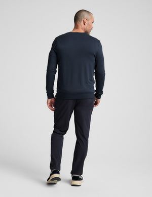Rear view of navy Men's All Terrain Pant, showcasing a regular fit, straight-leg silhouette, and full-length design.