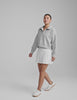 gray cropped long sleeve pullover with a v-neck collared neckline. 