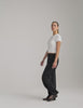 black mid rise relaxed fit wide leg pant with front side seam pockets and back pockets. 