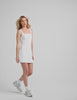 white mini dress with slit at sides