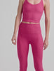 pink cropped tank top with a v-neckline and high racerback. 