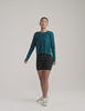 blue long sleeve crew neck top. 