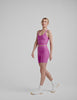 pink cropped high racerback tank with a v neckline. 