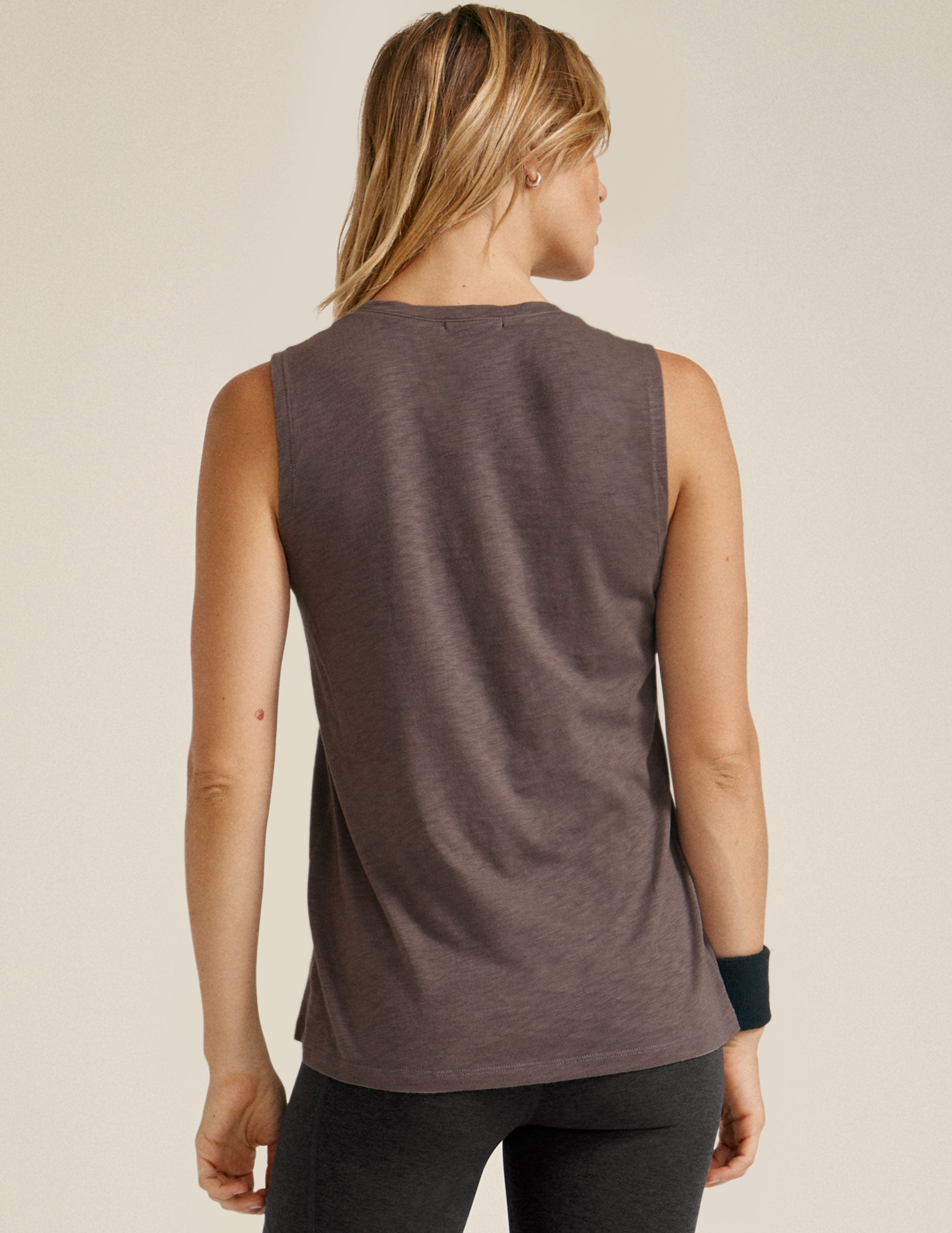 brown scoop neck tank paired with black leggings