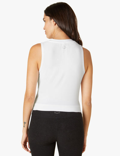 white sleeveless tank with twist front detail