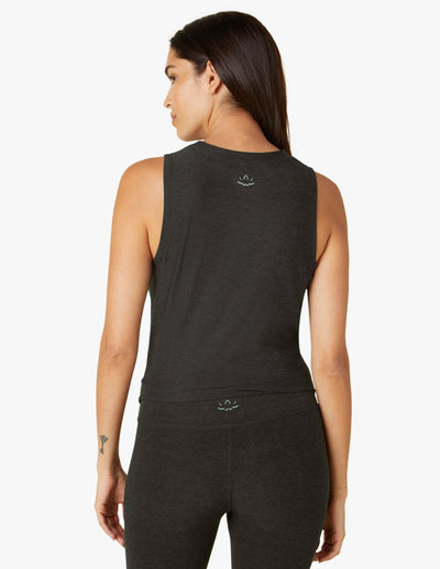 black sleeveless tank with twist front detail