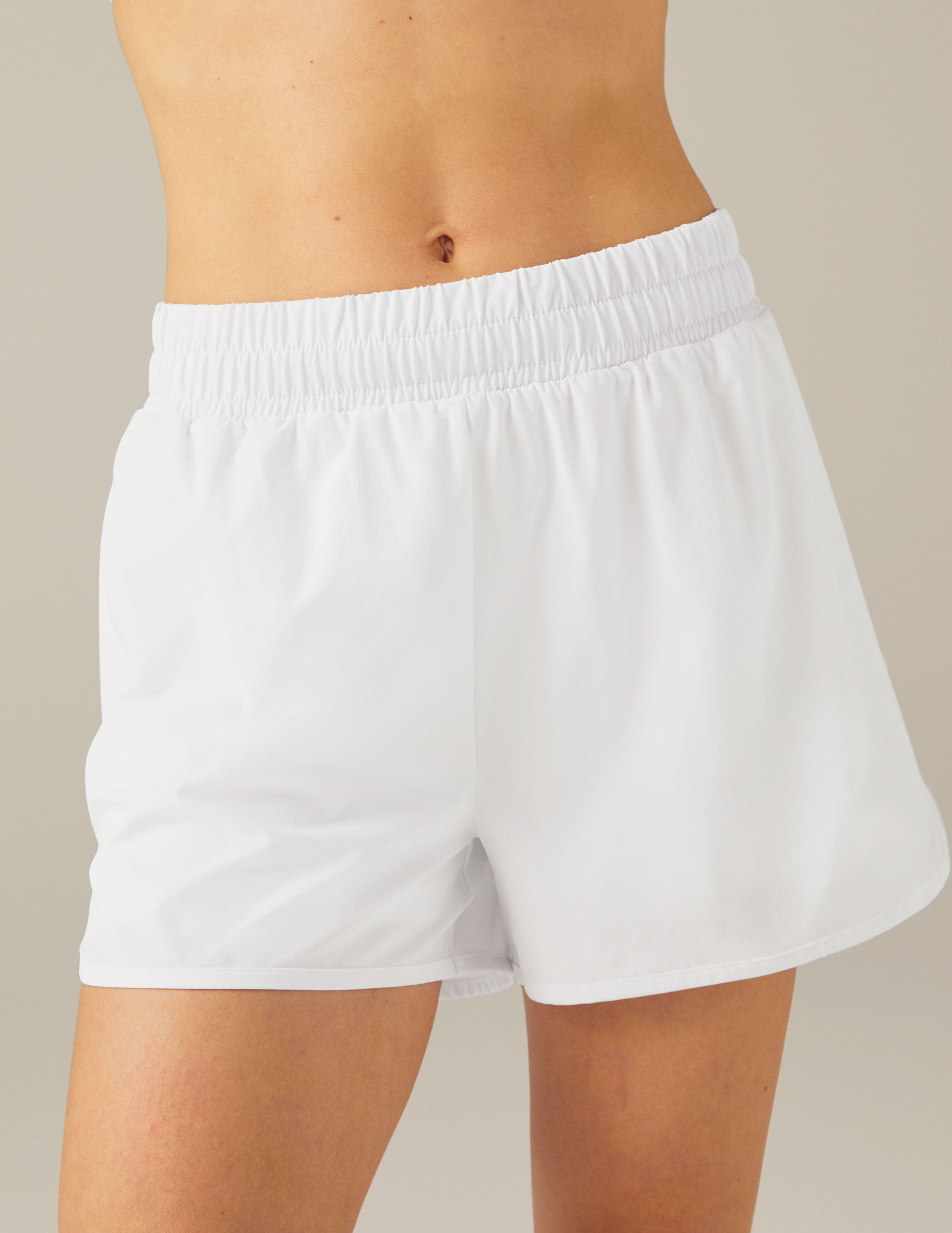white shorts with seamless short detail inside with pockets