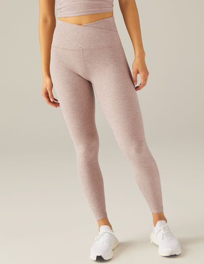 pink high waisted legging with over lapping detail paired with pink bra top
