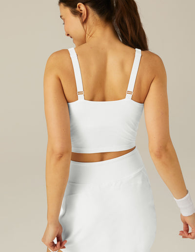 white v neck crop top with criss cross back detail