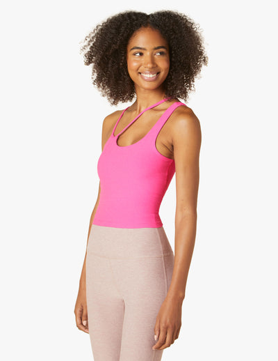 pink crop top with asymmetrical strap