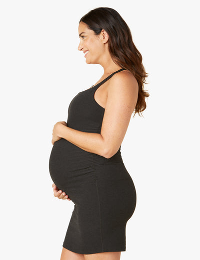 black sleeveless short slim fitting maternity dress with cross straps 