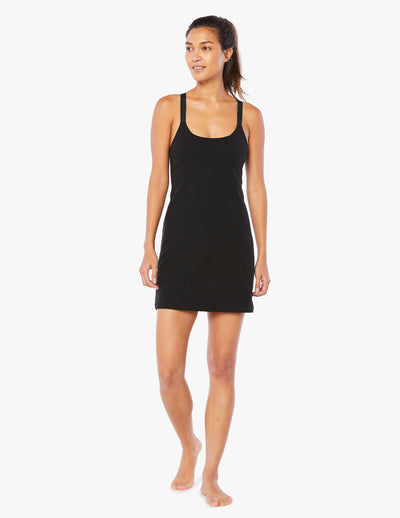 black short slim fitting dress with cross straps and built in compression shorts